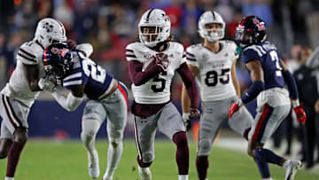 OXFORD, MISSISSIPPI - NOVEMBER 24: Lideatrick Griffin #5 of the Mississippi State Bulldogs carries the ball during the first half against the Mississippi State Bulldogs at Vaught-Hemingway Stadium on November 24, 2022 in Oxford, Mississippi. (Photo by Justin Ford/Getty Images)