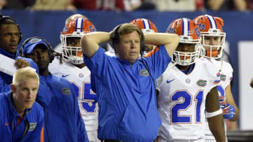 Dec 5, 2015; Atlanta, GA, USA; Florida Gators head coach Jim McElwain reacts during the second quarter of the 2015 SEC Championship Game against the Alabama Crimson Tide at the Georgia Dome. Mandatory Credit: John David Mercer-USA TODAY Sports