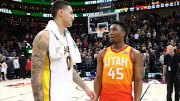 SALT LAKE CITY, UT - APRIL 3: Donovan Mitchell #45 of the Utah Jazz and Kyle Kuzma #0 of the Los Angeles Lakers speak after the game between the two teams on April 3, 2018 at vivint.SmartHome Arena in Salt Lake City, Utah. Copyright 2018 NBAE (Photo by Melissa Majchrzak/NBAE via Getty Images)