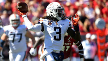 RALEIGH, NC - SEPTEMBER 29: Bryce Perkins #3 of the Virginia Cavaliers passes the ball against the North Carolina State Wolfpack at Carter-Finley Stadium on September 29, 2018 in Raleigh, North Carolina. NC State won 35-21. (Photo by Lance King/Getty Images)