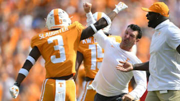 Tennessee defensive back Doneiko Slaughter (3) celebrates with a coach during an NCAA college football game between the Tennessee Volunteers and Pittsburgh Panthers in Knoxville, Tenn. on Saturday, September 11, 2021.Utvpitt0911 2095