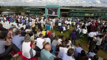 July 4, 2012; London, ENGLAND; A general view as tennis fans watch the match between Andy Murray (GBR) and David Ferrer (ESP) on a large screen outside of center court on day nine of the 2012 Wimbledon Championships at the All England Lawn Tennis Club. Mandatory Credit: Susan Mullane-USA TODAY Sports