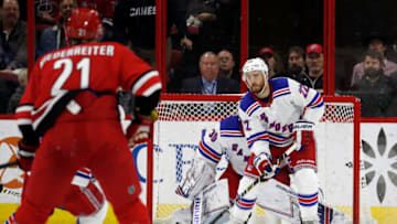 RALEIGH, NC - FEBRUARY 19: Kevin Shattenkirk #22 of the New York Rangers looks to pass the puck down ice against the Carolina Hurricanes during an NHL game on February 19, 2019 at PNC Arena in Raleigh, North Carolina. (Photo by Karl DeBlaker/NHLI via Getty Images)