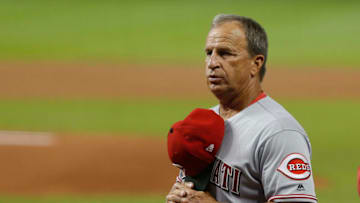 MIAMI, FL - SEPTEMBER 22: Interim manager Jim Riggleman of the Cincinnati Reds stands for the national anthem before play against the Miami Marlins at Marlins Park on September 22, 2018 in Miami, Florida. (Photo by Joe Skipper/Getty Images)