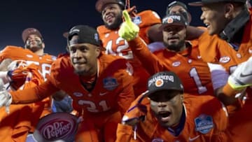 Dec 5, 2015; Charlotte, NC, USA; The Clemson Tigers celebrate after defeating the North Carolina Tar Heels 45-37 in the ACC football championship game at Bank of America Stadium. Mandatory Credit: Joshua S. Kelly-USA TODAY Sports