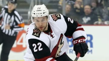 Feb 29, 2016; Pittsburgh, PA, USA; Arizona Coyotes right wing Craig Cunningham (22) carries the puck against the Pittsburgh Penguins during the first period at the CONSOL Energy Center. The Penguins won 6-0. Mandatory Credit: Charles LeClaire-USA TODAY Sports