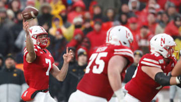 Nov 29, 2019; Lincoln, NE, USA; Nebraska Cornhuskers quarterback Luke McCaffrey (7) trows a touchdown pass during the game against the Iowa Hawkeyes in the second half at Memorial Stadium. Mandatory Credit: Bruce Thorson-USA TODAY Sports