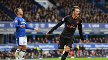 LIVERPOOL, ENGLAND - OCTOBER 22: Mesut Ozil of Arsenal celebrates scoring his sides second goal during the Premier League match between Everton and Arsenal at Goodison Park on October 22, 2017 in Liverpool, England. (Photo by Gareth Copley/Getty Images)