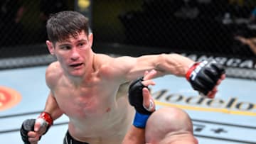 LAS VEGAS, NEVADA - JUNE 26: (L-R) Charles Rosa punches Justin Jaynes in a featherweight fight during the UFC Fight Night event at UFC APEX on June 26, 2021 in Las Vegas, Nevada. (Photo by Chris Unger/Zuffa LLC)