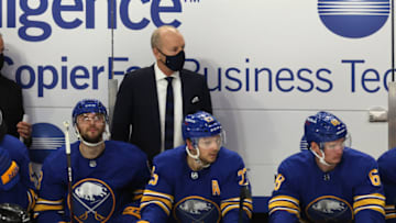 Jan 14, 2021; Buffalo, New York, USA; Buffalo Sabres head coach Ralph Krueger watches from the bench during the second period against the Washington Capitals at KeyBank Center. Mandatory Credit: Timothy T. Ludwig-USA TODAY Sports