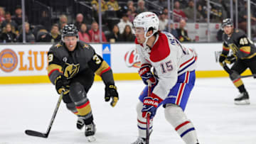 LAS VEGAS, NEVADA - OCTOBER 30: Alex Newhook #15 of the Montreal Canadiens skates with the puck against Brayden McNabb #3 of the Vegas Golden Knights in the first period of their game at T-Mobile Arena on October 30, 2023 in Las Vegas, Nevada. (Photo by Ethan Miller/Getty Images)