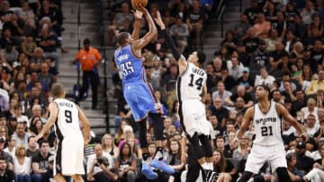 May 10, 2016; San Antonio, TX, USA; Oklahoma City Thunder small forward Kevin Durant (35) shoots the ball over San Antonio Spurs shooting guard Danny Green (14) in game five of the second round of the NBA Playoffs at AT&T Center. Mandatory Credit: Soobum Im-USA TODAY Sports