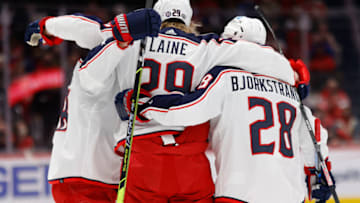 Feb 8, 2022; Washington, District of Columbia, USA; Columbus Blue Jackets left wing Patrik Laine (29) celebrates with teammates after scoring a goal against the Washington Capitals during the second period at Capital One Arena. Mandatory Credit: Geoff Burke-USA TODAY Sports