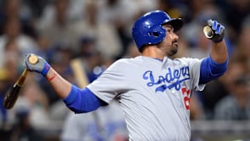 Apr 5, 2016; San Diego, CA, USA; Los Angeles Dodgers first baseman Adrian Gonzalez (23) doubles during the fourth inning against the San Diego Padres at Petco Park. Mandatory Credit: Jake Roth-USA TODAY Sports