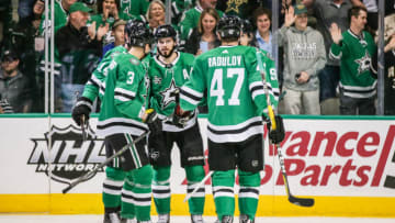 DALLAS, TX - MARCH 05: Dallas Stars center Tyler Seguin (91) scores a goal against Ottawa Senators goaltender Craig Anderson (41) and celebrates with his teammates during the game between the Dallas Stars and the Ottawa Senators on March 5, 2018 at the American Airlines Center in Dallas, Texas. Ottawa defeats Dallas 3-2 in overtime. (Photo by Matthew Pearce/Icon Sportswire via Getty Images)