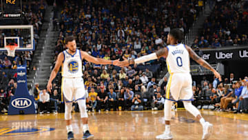 SAN FRANCISCO, CA - OCTOBER 10: Stephen Curry #30 of the Golden State Warriors and D'Angelo Russell #0 of the Golden State Warriors high-five during a pre-season game against the Minnesota Timberwolves on October 10, 2019 at Chase Center in San Francisco, California. NOTE TO USER: User expressly acknowledges and agrees that, by downloading and/or using this Photograph, user is consenting to the terms and conditions of the Getty Images License Agreement. Mandatory Copyright Notice: Copyright 2019 NBAE (Photo by Noah Graham/NBAE via Getty Images)