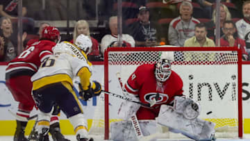 RALEIGH, NC - SEPTEMBER 27: Nashville Predators center Ryan Johansen (92) end the game in overtime by getting a shot by Carolina Hurricanes goaltender James Reimer (47) during an NHL Pre-Season game between the Carolina Hurricanes and the Nashville Predators on September 27, 2019 at the PNC Arena in Raleigh, NC. (Photo by John McCreary/Icon Sportswire via Getty Images)
