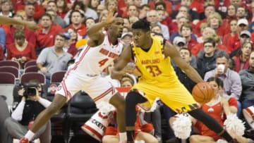 Jan 31, 2016; Columbus, OH, USA; Maryland Terrapins center Diamond Stone (33) dribbles the ball as Ohio State Buckeyes center Daniel Giddens (4) defends during the first half at Value City Arena. Mandatory Credit: Greg Bartram-USA TODAY Sports
