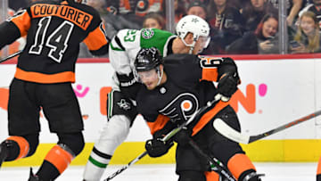 Oct 19, 2019; Philadelphia, PA, USA; Dallas Stars defenseman Esa Lindell (23) and Philadelphia Flyers defenseman Justin Braun (61) battle during the second period at Wells Fargo Center. Mandatory Credit: Eric Hartline-USA TODAY Sports