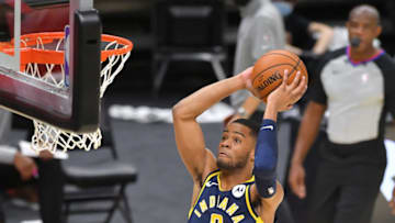 CLEVELAND, OHIO - DECEMBER 12: Cassius Stanley #2 of the Indiana Pacers dunks over Thon Maker #14 of the Cleveland Cavaliers during the second half of a preseason game at Rocket Mortgage Fieldhouse on December 12, 2020 in Cleveland, Ohio. NOTE TO USER: User expressly acknowledges and agrees that, by downloading and/or using this Photograph, user is consenting to the terms and conditions of the Getty Images License Agreement. (Photo by Jason Miller/Getty Images)