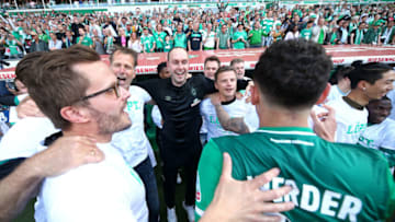 Werder Bremen celebrate their promotion to the Bundesliga. (Photo by Joosep Martinson/Getty Images)