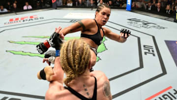 EDMONTON, AB - SEPTEMBER 09: (L-R) Amanda Nunes of Brazil kicks Valentina Shevchenko of Kyrgyzstan in their women's bantamweight bout during the UFC 215 event inside the Rogers Place on September 9, 2017 in Edmonton, Alberta, Canada. (Photo by Jeff Bottari/Zuffa LLC/Zuffa LLC via Getty Images)