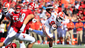 LOUISVILLE, KENTUCKY - OCTOBER 19: Travis Etienne #9 of the Clemson Tigers runs for a touchdown against the Louisville Cardinals at Cardinal Stadium on October 19, 2019 in Louisville, Kentucky. (Photo by Andy Lyons/Getty Images)