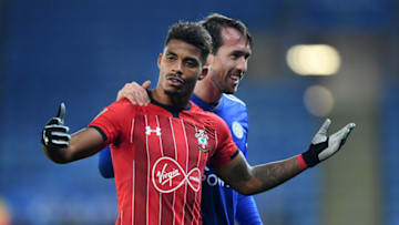 LEICESTER, ENGLAND - NOVEMBER 27: Mario Lemina of Southampton is consoled by Christian Fuchs of Leicester City as he reacts during the Carabao Cup Fourth Round match between Leicester City and Southampton at The King Power Stadium on October 30, 2018 in Leicester, England. (Photo by Michael Regan/Getty Images)
