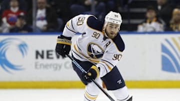 Jan 16, 2016; Buffalo, NY, USA; Buffalo Sabres center Ryan O'Reilly (90) brings the puck up the ice during the second period against the Washington Capitals at First Niagara Center. Mandatory Credit: Kevin Hoffman-USA TODAY Sports
