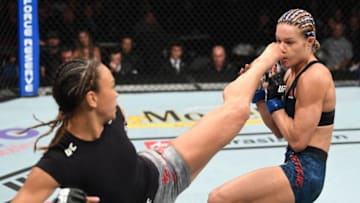 LAS VEGAS, NV - OCTOBER 06: Michelle Waterson (l) kicks Felice Herrig in their women's strawweight bout during the UFC 229 event inside T-Mobile Arena on October 6, 2018 in Las Vegas, Nevada. (Photo by Josh Hedges/Zuffa LLC/Zuffa LLC)