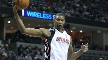 Dec 29, 2015; Memphis, TN, USA; Miami Heat forward Chris Bosh (1) grabs a rebound in the first quarter against the Memphis Grizzlies at FedExForum. Mandatory Credit: Nelson Chenault-USA TODAY Sports