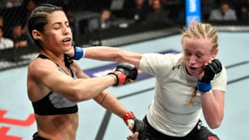 LOS ANGELES, CA - AUGUST 04: (R-L) JJ Aldrich punches Polyana Viana of Brazil in their women's strawweight fight during the UFC 227 event inside Staples Center on August 4, 2018 in Los Angeles, California. (Photo by Jeff Bottari/Zuffa LLC/Zuffa LLC via Getty Images)