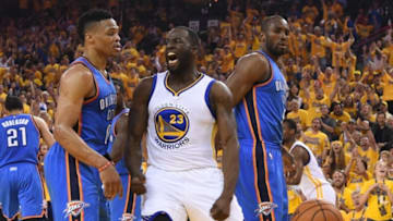 May 30, 2016; Oakland, CA, USA; Golden State Warriors forward Draymond Green (23) celebrates after making a basket against Oklahoma City Thunder guard Russell Westbrook (0) and forward Serge Ibaka (9) during the first quarter in game seven of the Western conference finals of the NBA Playoffs at Oracle Arena. Mandatory Credit: Kyle Terada-USA TODAY Sports