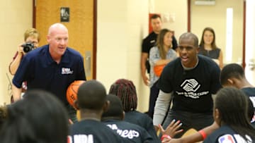 WINSTON SALEM, NC - SEPTEMBER 13: Chris Paul #99 of the Houston Rockets interacts with kids during the NBA Cares Winston Salem State farm Assist Dedication event in Winston Salem, North Carolina at the Salvation Army - International Boys and Girls Club on September 13, 2017. NOTE TO USER: User expressly acknowledges and agrees that, by downloading and or using this photograph, User is consenting to the terms and conditions of the Getty Images License Agreement. Mandatory Copyright Notice: Copyright 2017 NBAE (Photo by Brock Williams-Smith/NBAE via Getty Images)