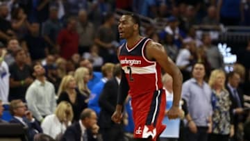 Oct 28, 2015; Orlando, FL, USA; Washington Wizards guard John Wall (2) reacts after he made the go ahead shot during the fourth quarter against the Orlando Magic at Amway Center. Washington Wizards defeated the Orlando Magic 88-87. Mandatory Credit: Kim Klement-USA TODAY Sports