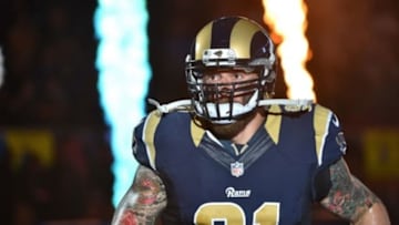 Sep 13, 2015; St. Louis, MO, USA; St. Louis Rams defensive end Chris Long (91) runs on to the field before the game between the St. Louis Rams and the Seattle Seahawks during the first half at the Edward Jones Dome. Mandatory Credit: Jasen Vinlove-USA TODAY Sports