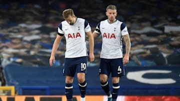 Tottenham Hotspur's English striker Harry Kane (L) leaves the pitch injured during the English Premier League football match between Everton and Tottenham Hotspur at Goodison Park in Liverpool, north west England on April 16, 2021. - RESTRICTED TO EDITORIAL USE. No use with unauthorized audio, video, data, fixture lists, club/league logos or 'live' services. Online in-match use limited to 120 images. An additional 40 images may be used in extra time. No video emulation. Social media in-match use limited to 120 images. An additional 40 images may be used in extra time. No use in betting publications, games or single club/league/player publications. (Photo by PETER POWELL / POOL / AFP) / RESTRICTED TO EDITORIAL USE. No use with unauthorized audio, video, data, fixture lists, club/league logos or 'live' services. Online in-match use limited to 120 images. An additional 40 images may be used in extra time. No video emulation. Social media in-match use limited to 120 images. An additional 40 images may be used in extra time. No use in betting publications, games or single club/league/player publications. / RESTRICTED TO EDITORIAL USE. No use with unauthorized audio, video, data, fixture lists, club/league logos or 'live' services. Online in-match use limited to 120 images. An additional 40 images may be used in extra time. No video emulation. Social media in-match use limited to 120 images. An additional 40 images may be used in extra time. No use in betting publications, games or single club/league/player publications. (Photo by PETER POWELL/POOL/AFP via Getty Images)
