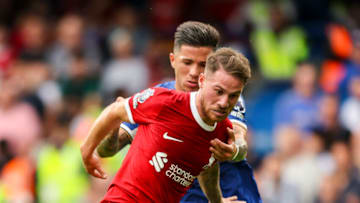 LONDON, ENGLAND - AUGUST 13: Alexis Mac Allister of Liverpool and Enzo Fernández of Chelsea tussle for the ball during the Premier League match between Chelsea FC and Liverpool FC at Stamford Bridge on August 13, 2023 in London, England. (Photo by Robin Jones/Getty Images)