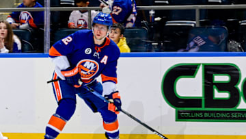 ELMONT, NEW YORK - JANUARY 30: Josh Bailey #12 of the New York Islanders skates with the puck against the Minnesota Wild at UBS Arena on January 30, 2022 in Elmont, New York. (Photo by Steven Ryan/Getty Images)