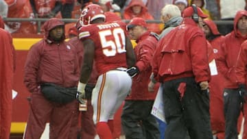 Nov 29, 2015; Kansas City, MO, USA; Kansas City Chiefs outside linebacker Justin Houston (50) is helped off the field against the Buffalo Bills in the first half at Arrowhead Stadium. Mandatory Credit: John Rieger-USA TODAY Sports