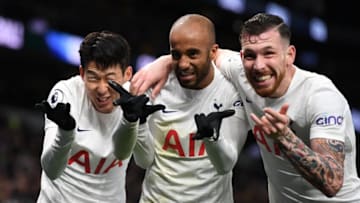 Tottenham Hotspur's South Korean striker Son Heung-Min (L), Tottenham Hotspur's Brazilian midfielder Lucas Moura (C) and Tottenham Hotspur's Danish midfielder Pierre-Emile Hojbjerg (R) celebrate after Son scores their third goal during the English Premier League football match between Tottenham Hotspur and Norwich City at Tottenham Hotspur Stadium in London, on December 5, 2021. - - RESTRICTED TO EDITORIAL USE. No use with unauthorized audio, video, data, fixture lists, club/league logos or 'live' services. Online in-match use limited to 120 images. An additional 40 images may be used in extra time. No video emulation. Social media in-match use limited to 120 images. An additional 40 images may be used in extra time. No use in betting publications, games or single club/league/player publications. (Photo by Daniel LEAL / AFP) / RESTRICTED TO EDITORIAL USE. No use with unauthorized audio, video, data, fixture lists, club/league logos or 'live' services. Online in-match use limited to 120 images. An additional 40 images may be used in extra time. No video emulation. Social media in-match use limited to 120 images. An additional 40 images may be used in extra time. No use in betting publications, games or single club/league/player publications. / RESTRICTED TO EDITORIAL USE. No use with unauthorized audio, video, data, fixture lists, club/league logos or 'live' services. Online in-match use limited to 120 images. An additional 40 images may be used in extra time. No video emulation. Social media in-match use limited to 120 images. An additional 40 images may be used in extra time. No use in betting publications, games or single club/league/player publications. (Photo by DANIEL LEAL/AFP via Getty Images)