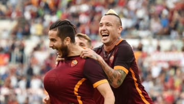 ROME, ITALY - SEPTEMBER 26: Kostas Manolas of AS Roma celebrates with his teammates Lucas Digne and Radja Nainggolan after scoring the opening goal during the Serie A match between AS Roma and Carpi FC at Stadio Olimpico on September 26, 2015 in Rome, Italy. (Photo by Giuseppe Bellini/Getty Images)