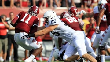 Sep 5, 2015; Philadelphia, PA, USA; Penn State Nittany Lions defensive end Carl Nassib (95) sacks Temple Owls quarterback P.J. Walker (11) during the second quarter at Lincoln Financial Field. Mandatory Credit: Matthew O