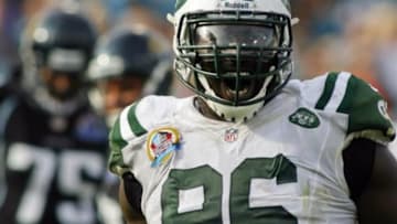Dec 9, 2012; Jacksonville FL, USA; New York Jets defensive end Muhammad Wilkerson (96) celebrates sacking Jacksonville Jaguars quarterback Chad Henne (not pictured) in the third quarter of their game at EverBank Field. The New York Jets beat the Jacksonville Jaguars 17-10. Mandatory Credit: Phil Sears-USA TODAY Sports