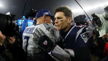 FOXBOROUGH, MASSACHUSETTS - JANUARY 04: Ryan Tannehill #17 of the Tennessee Titans is congratulated by Tom Brady #12 of the New England Patriots after their 20-13 win in the AFC Wild Card Playoff game at Gillette Stadium on January 04, 2020 in Foxborough, Massachusetts. (Photo by Maddie Meyer/Getty Images)