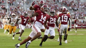Sep 17, 2022; Tuscaloosa, Alabama, USA; Alabama Crimson Tide defensive back Brian Branch (14) returns a punt for a touchdown against the UL Monroe Warhawks at Bryant-Denny Stadium. Alabama won 63-7. Mandatory Credit: Gary Cosby Jr.-USA TODAY Sports