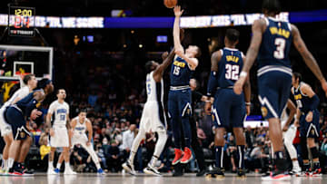 Denver Nuggets center Nikola Jokic (15) wins the tipoff against Orlando Magic center Mo Bamba (5) at Ball Arena on 14 Feb. 2022. (Isaiah J. Downing-USA TODAY Sports)