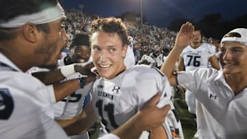 BLACKSBURG, VA - SEPTEMBER 22: Quarterback Blake LaRussa #11 of the Old Dominion Monarchs celebrates the victory against the Virginia Tech Hokies at S. B. Ballard Stadium on September 22, 2018 in Norfolk, Virginia. (Photo by Michael Shroyer/Getty Images)