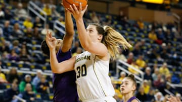 ANN ARBOR, MI - FEBRUARY 08: Michigan Wolverines center Hallie Thome (30) shoots over Northwestern Wildcats forward Pallas Kunaiyi-Akpanah (14) during a regular season Big 10 Conference basketball game between the Northwestern Wildcats and the Michigan Wolverines on February 8, 2018 at the Crisler Center in Ann Arbor, Michigan.(Photo by Scott W. Grau/Icon Sportswire via Getty Images)