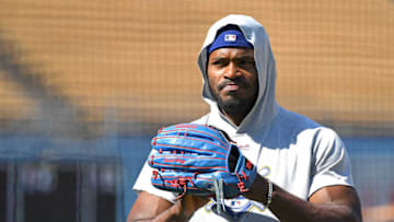 LOS ANGELES, CA - AUGUST 03: Yasiel Puig #66 of the Los Angeles Dodgers warms up before the game against the Houston Astros at Dodger Stadium on August 3, 2018 in Los Angeles, California. (Photo by Jayne Kamin-Oncea/Getty Images)